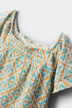 Blusa ikat para menina