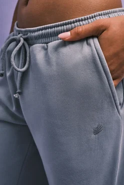 Calça comprida flare em felpa cinza