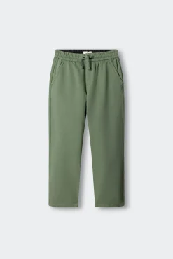 Calças chino de malha para menino