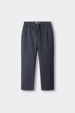 Calças chino de malha para menino
