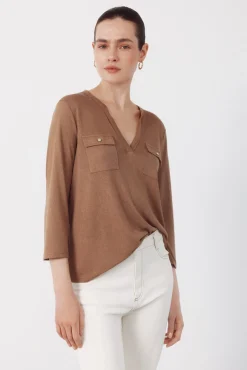 Camiseta com bolsos