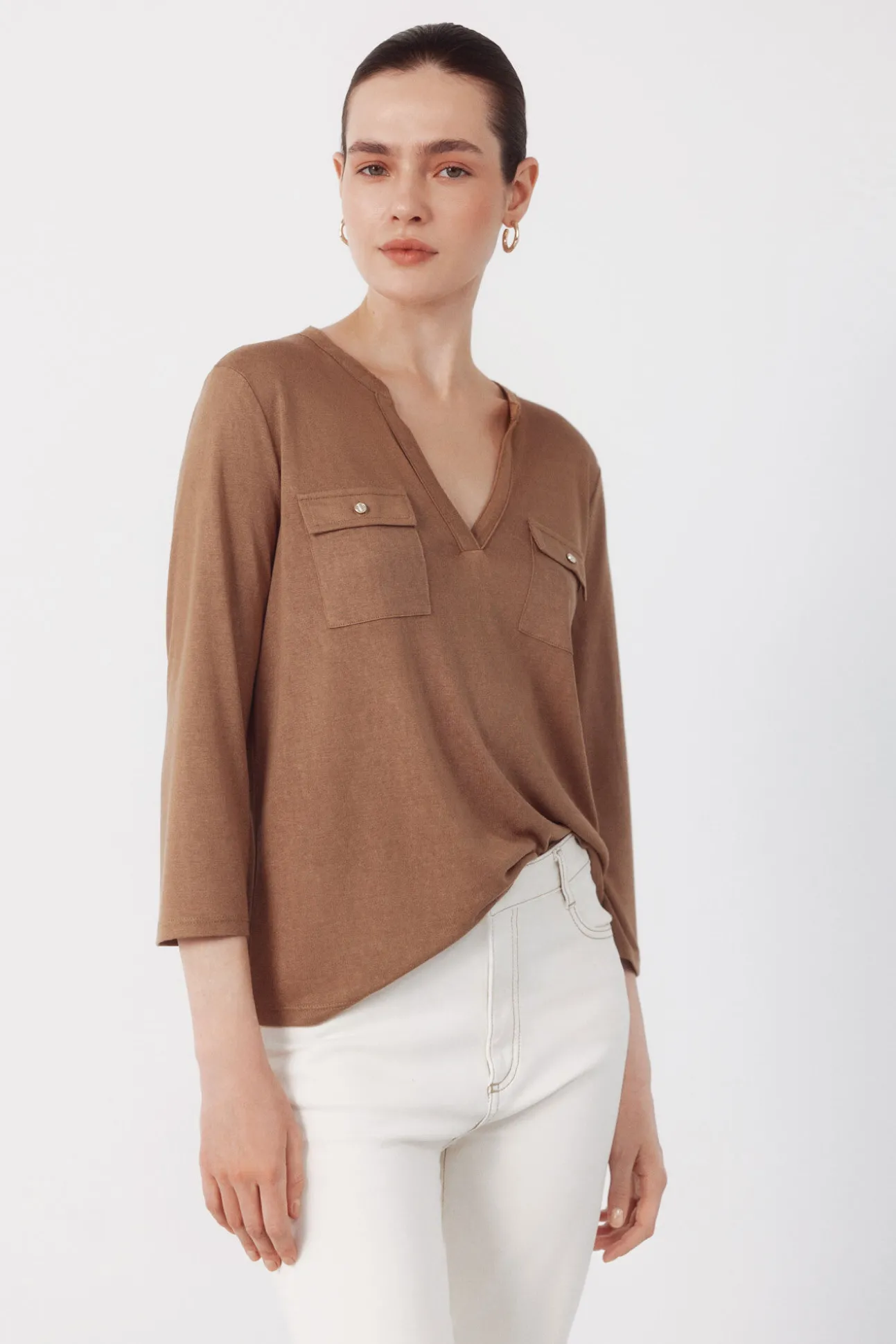 Camiseta com bolsos