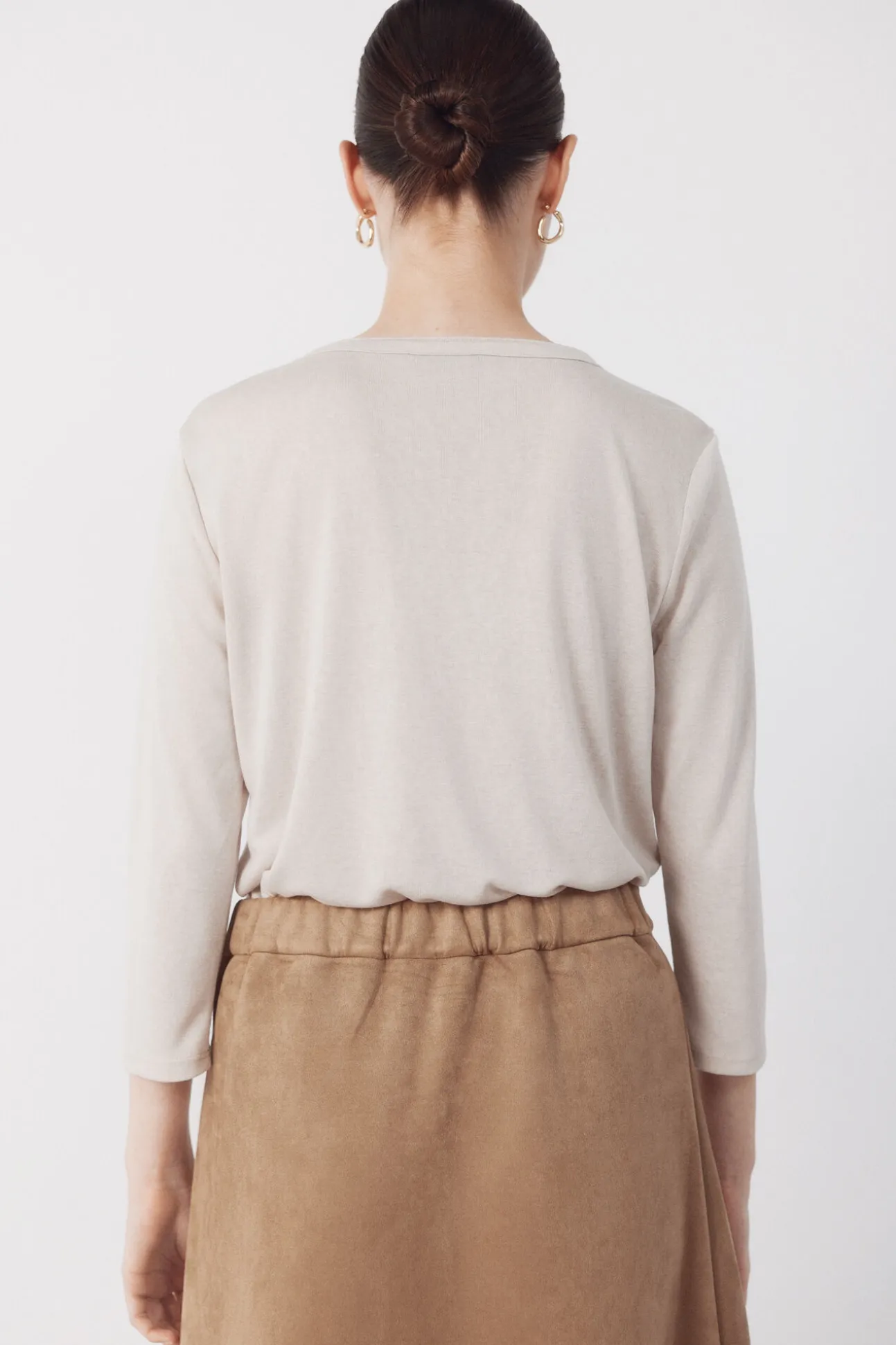 Camiseta com bolsos
