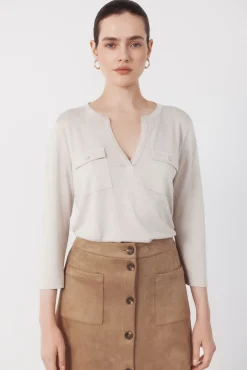 Camiseta com bolsos