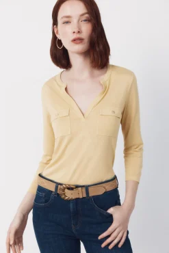 Camiseta com bolsos