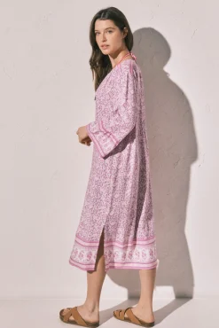 Camisola comprida estampado sanefa de flores