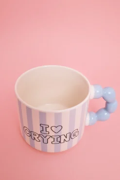 Caneca cerâmica azul com alça de bolinhas