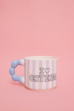 Caneca cerâmica azul com alça de bolinhas