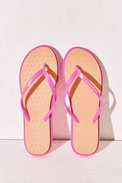 Chinelos de dedo com textura floral laranja