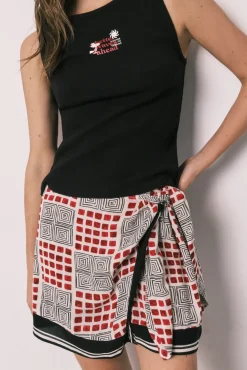 Conjunto top e saia-calção