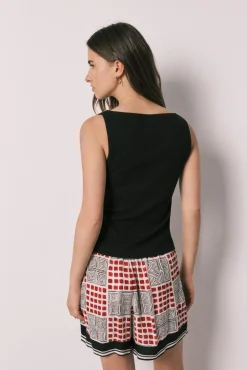 Conjunto top e saia-calção