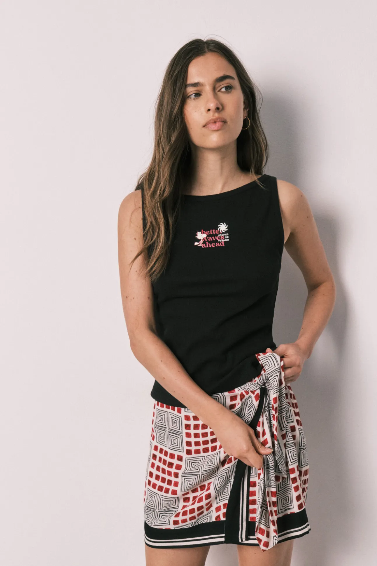 Conjunto top e saia-calção