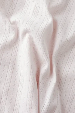 Conjunto top sem mangas e calções de malha