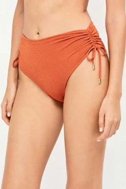 Cueca de biquíni cintura alta em tecido piqué lurex dourado