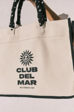 Mala grande estampada em lona bege
