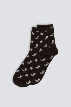 Meias compridas com botas e estrelas