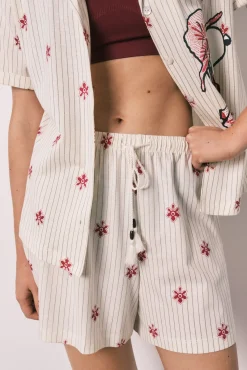 Pijama curto camiseiro de riscas Snoopy