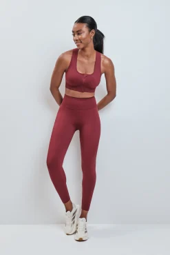 Soutien desportivo vermelho com fecho-éclair SEAMLESS FIT