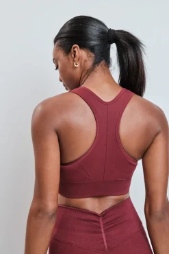 Soutien desportivo vermelho com fecho-éclair SEAMLESS FIT