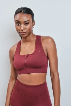 Soutien desportivo vermelho com fecho-éclair SEAMLESS FIT