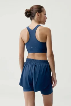 Top desportivo Bikila azul-marinho