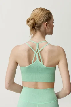 Top desportivo vermelho e verde menta