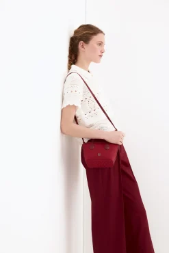 Top gola polo efeito crochet de malha