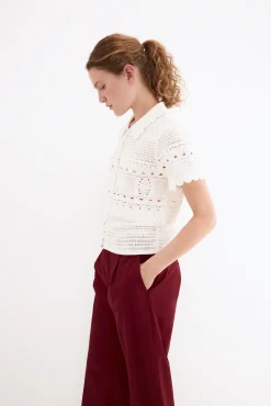 Top gola polo efeito crochet de malha